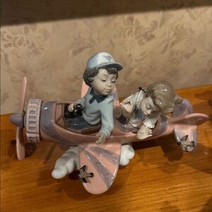 Lladro Children Airplane Figurine in Pink and Gray